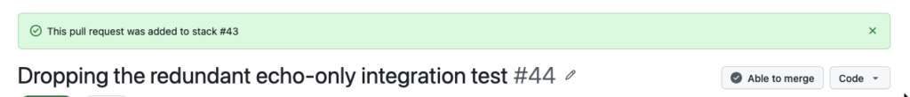 באנר ירוק: "This pull request was added to stack #43". מתחתיו כותרת PR #44, "Dropping the redundant echo-only integration test", עם סטטוס Able to merge.